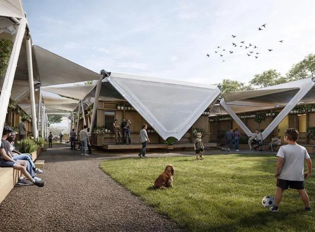 Residents between assembled Estia Homes in a shaded courtyard, a child plays soccer on the grass, a dog rests nearby, and neighbours gather and talk